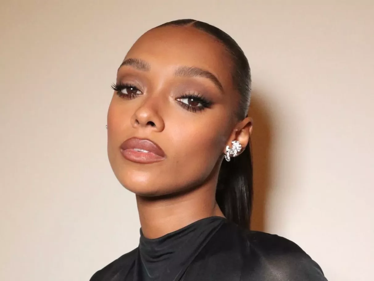 model poses wearing a nude smoky eye look